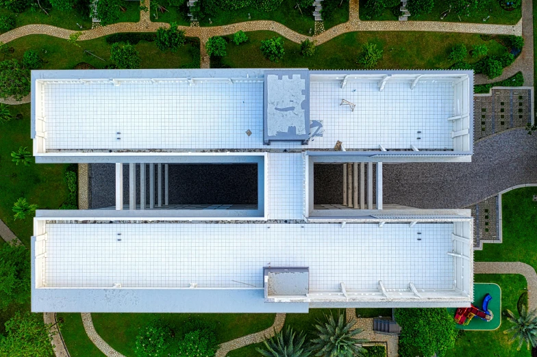 a bird's eye view of a modern house, inspired by Tadao Ando, unsplash contest winner, brutalism, ventilation shafts, white building, tiled, [ realistic photography ]