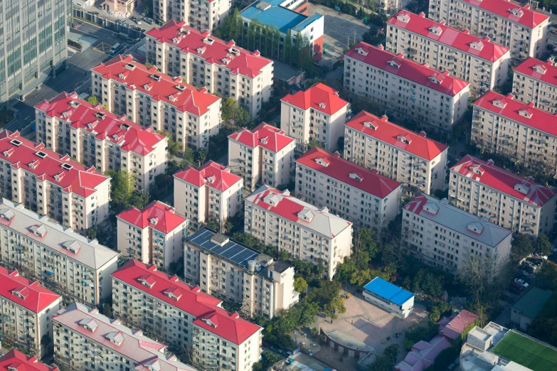 an aerial view of a city with red roofs, a portrait, by Yi Jaegwan, shutterstock, square, baotou china, apartments, panels