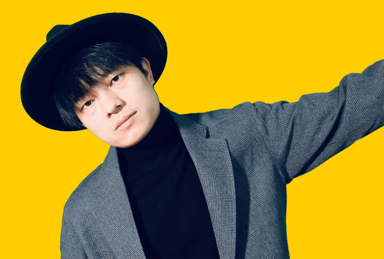 a close up of a person wearing a hat, an album cover, shin hanga, yellow backdrop, a man wearing a black jacket, confident pose, jeongseok lee