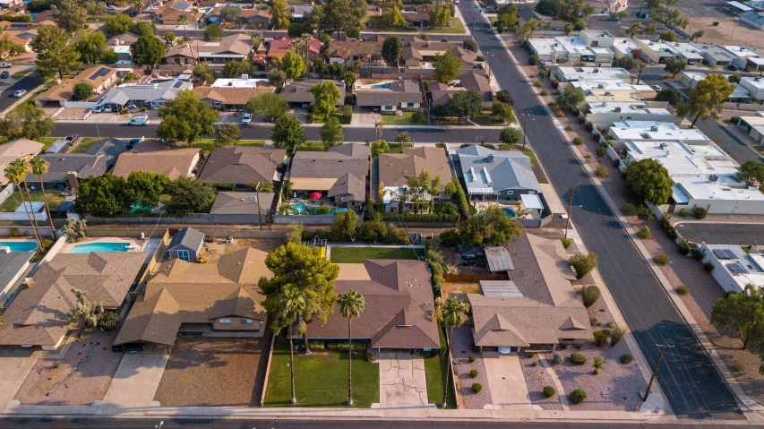 an aerial view of a neighborhood in the desert, a portrait, by Arnie Swekel, pexels, photorealism, multiple wide angles, in a suburban backyard, 15081959 21121991 01012000 4k, shot from the side