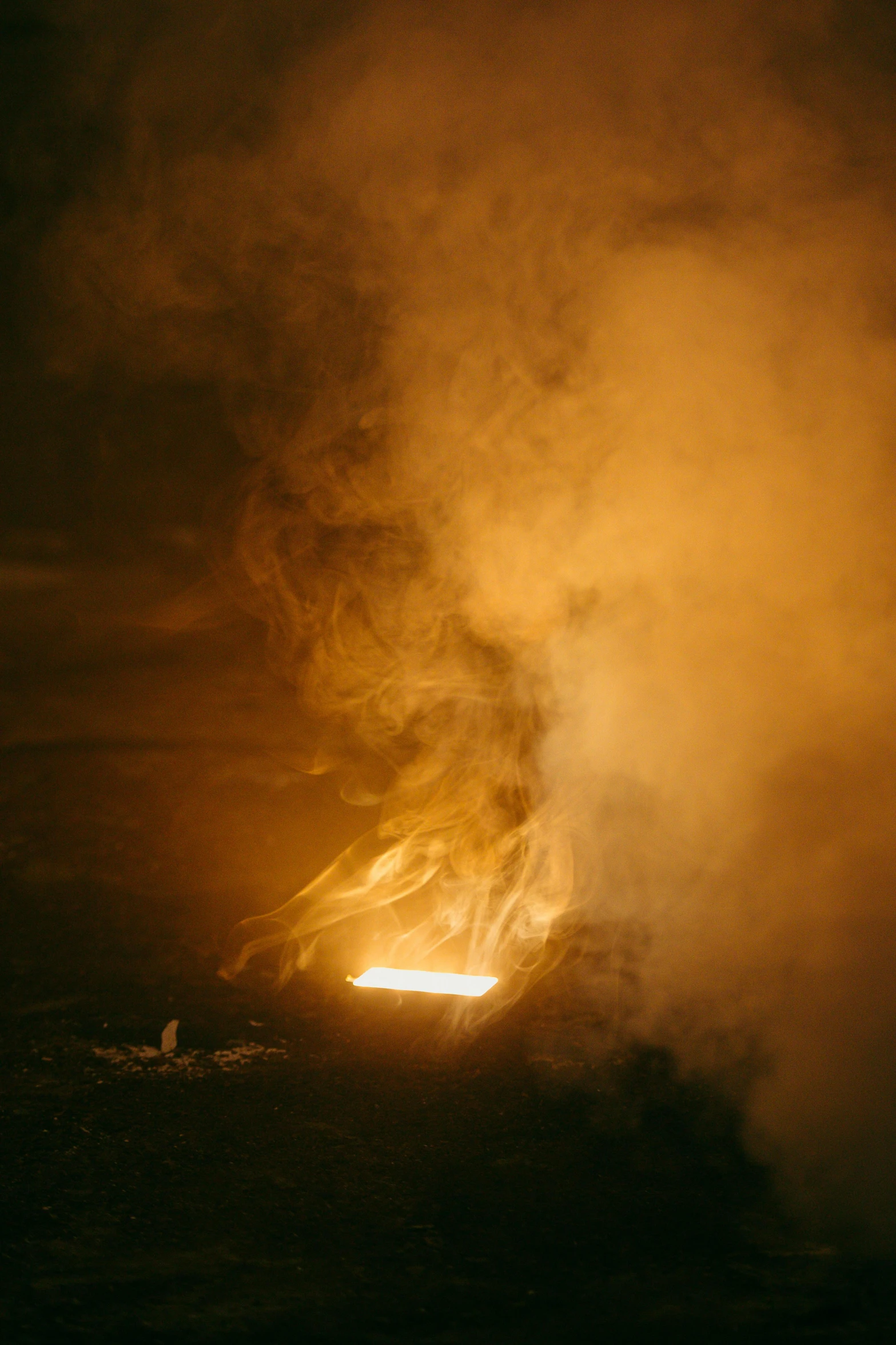 a large plume of smoke coming out of the ground, by Daniel Lieske, torchlit, big island, smelting pit'beeple, high quality photo