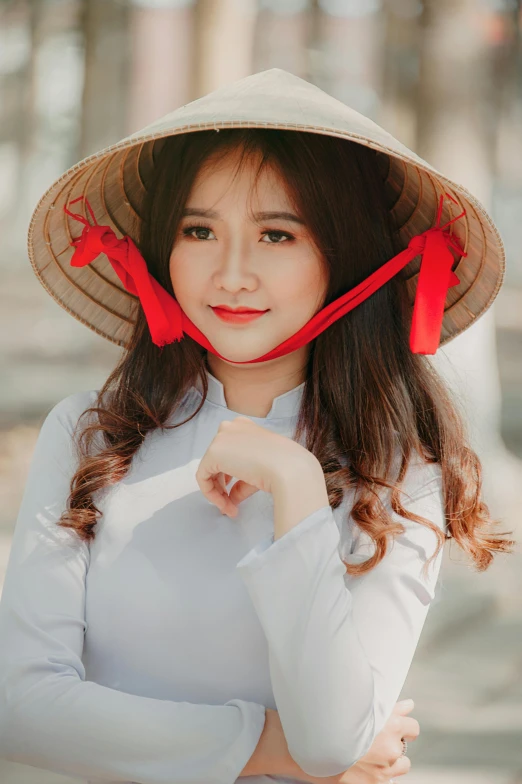 a woman in a hat poses for a picture, a picture, inspired by Tan Ting-pho, square, avatar image, vietnamese woman, casual photography