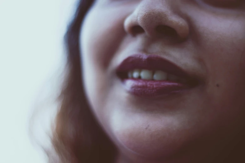 a close up of a person with a cell phone, smoothed lip line, shot on sony a 7, blurry image, instagram picture