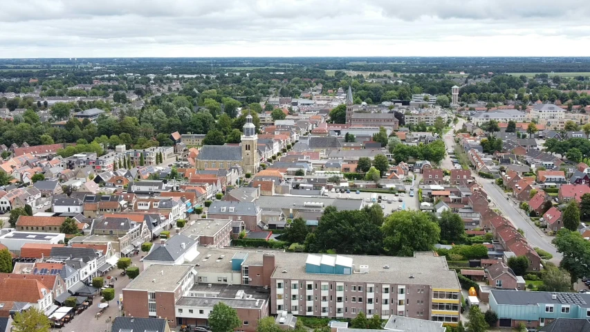 an aerial view of a city with lots of buildings, by Schelte a Bolswert, background image, eldenring, samma van klaarbergen, tourist photo