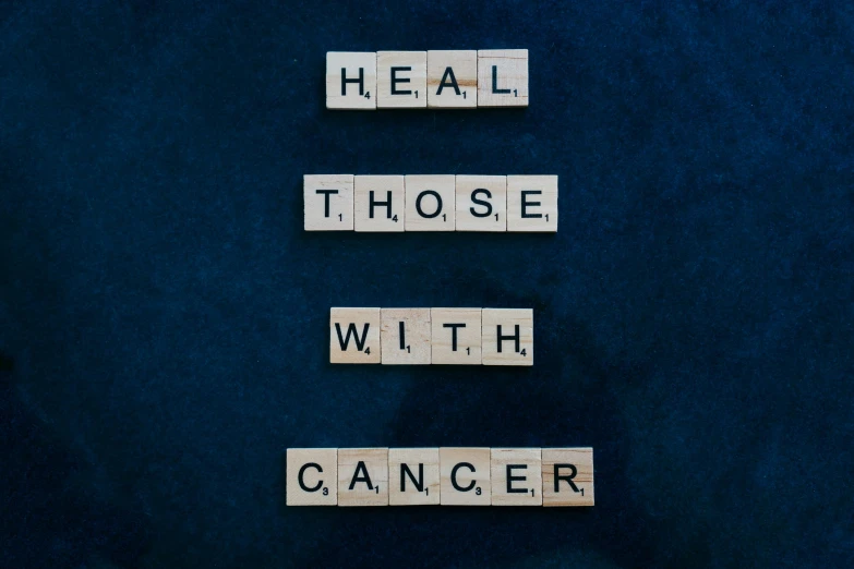 the words heal those with cancer spelled in scrabbles, a photo, pexels contest winner, renaissance, uhq, enamel, dark