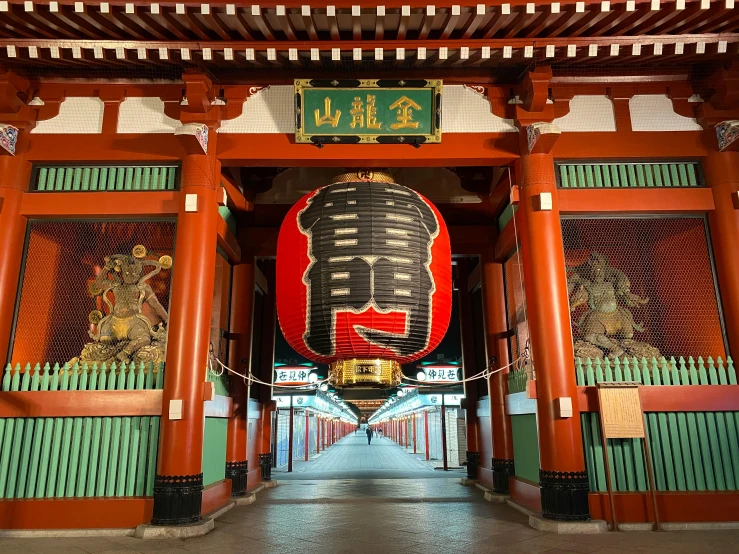 a picture of the entrance to a building, inspired by Itō Jakuchū, pexels contest winner, sōsaku hanga, vibrant red and green colours, giant majestic archways, hanging lanterns, with white kanji insignias