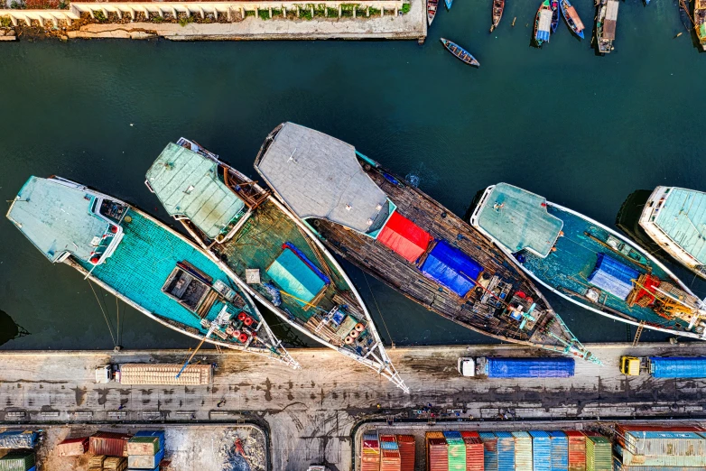 a group of boats sitting on top of a body of water, a digital rendering, pexels contest winner, supply chain economics, jia ruan, harbour, flatlay