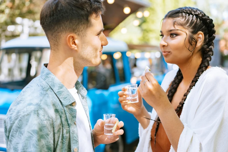 a man and a woman standing next to each other, pexels contest winner, renaissance, getting his tacos and drink), festival vibes, avatar image, greek ethnicity