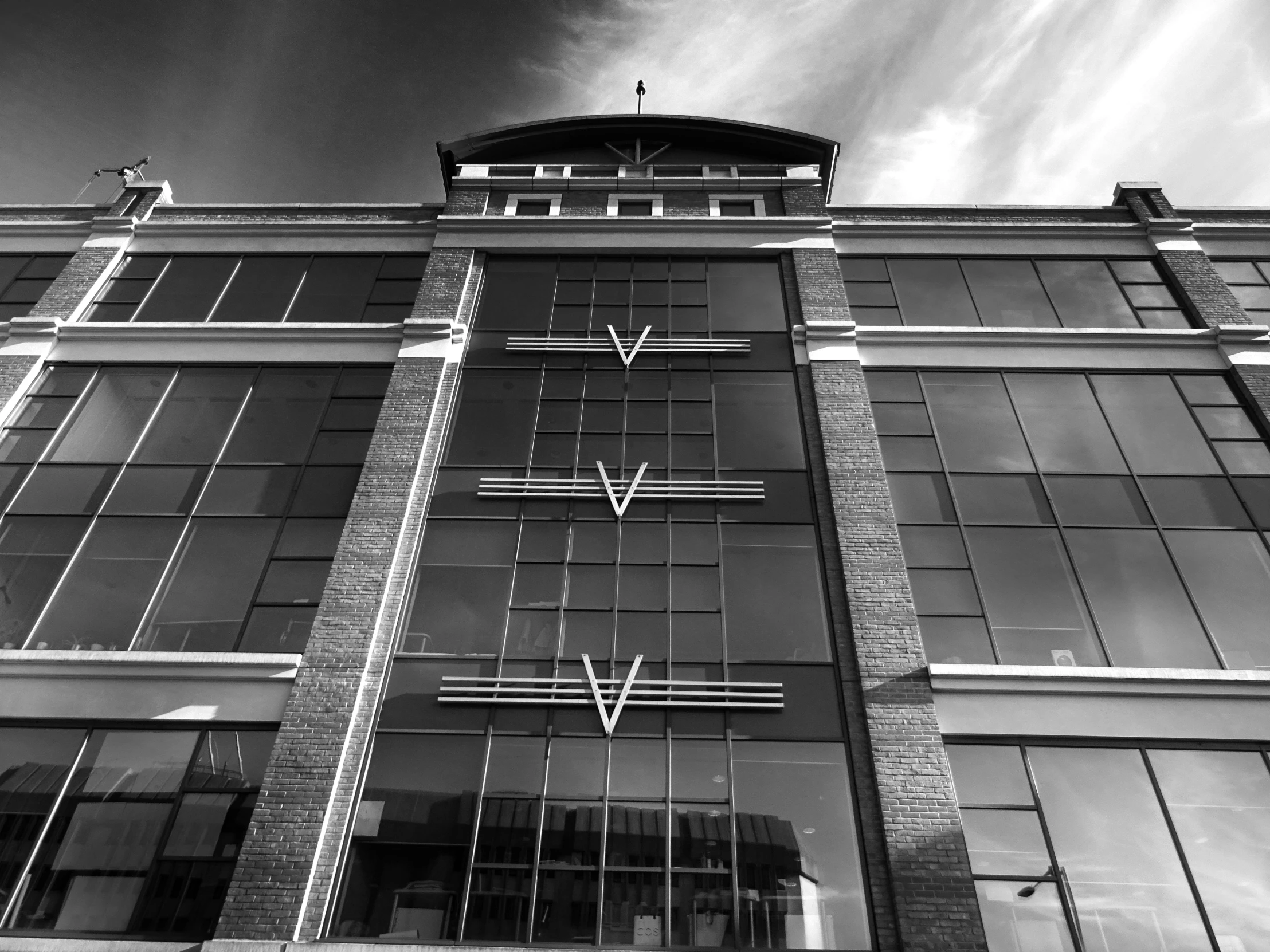 a black and white photo of a building, by Vincent Evans, sharp edges. poster, vmk myvmk, award-winnig photo