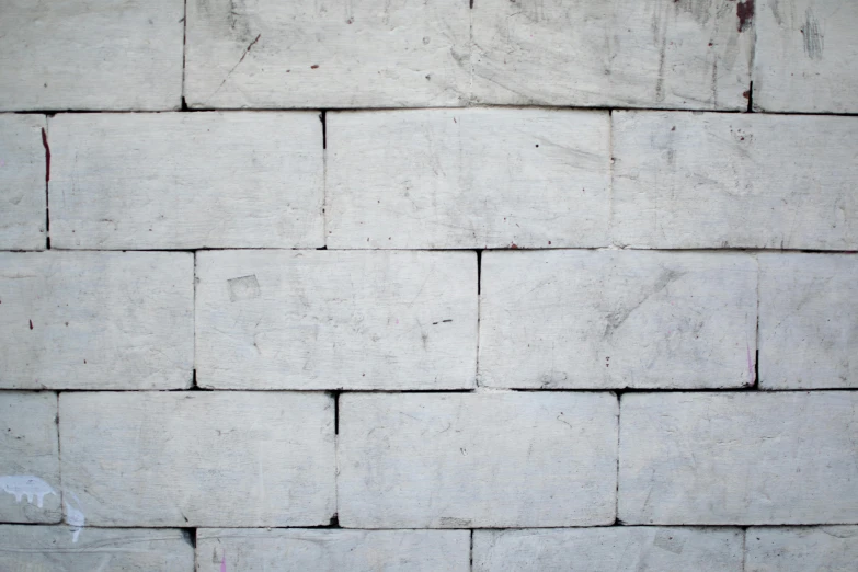 a fire hydrant in front of a white brick wall, inspired by Rachel Whiteread, unsplash, wood planks, silver，ivory, rectangular, blocks