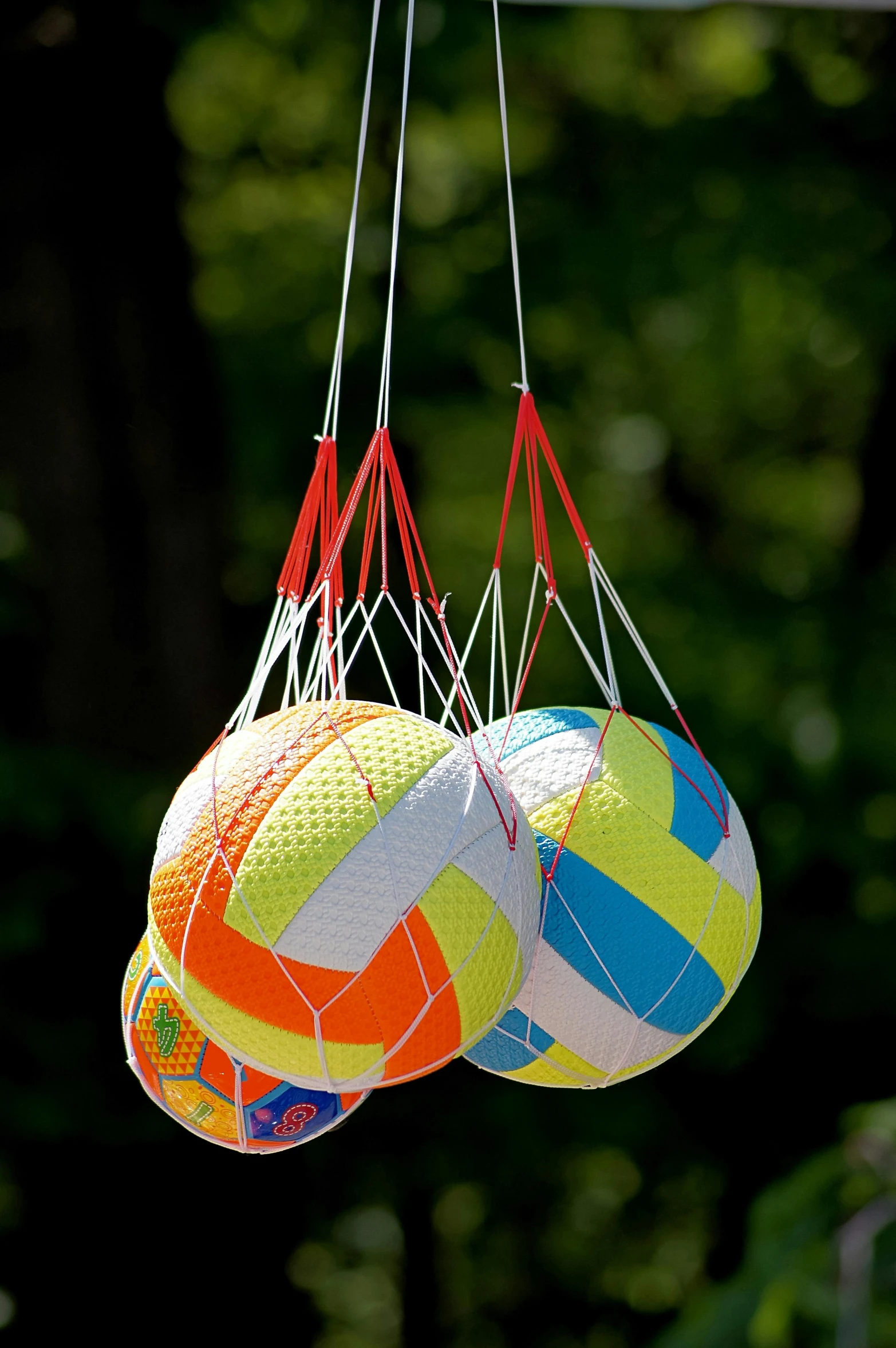 a couple of balls hanging from a net, summer swimming party, 165 cm tall, mini model, al fresco