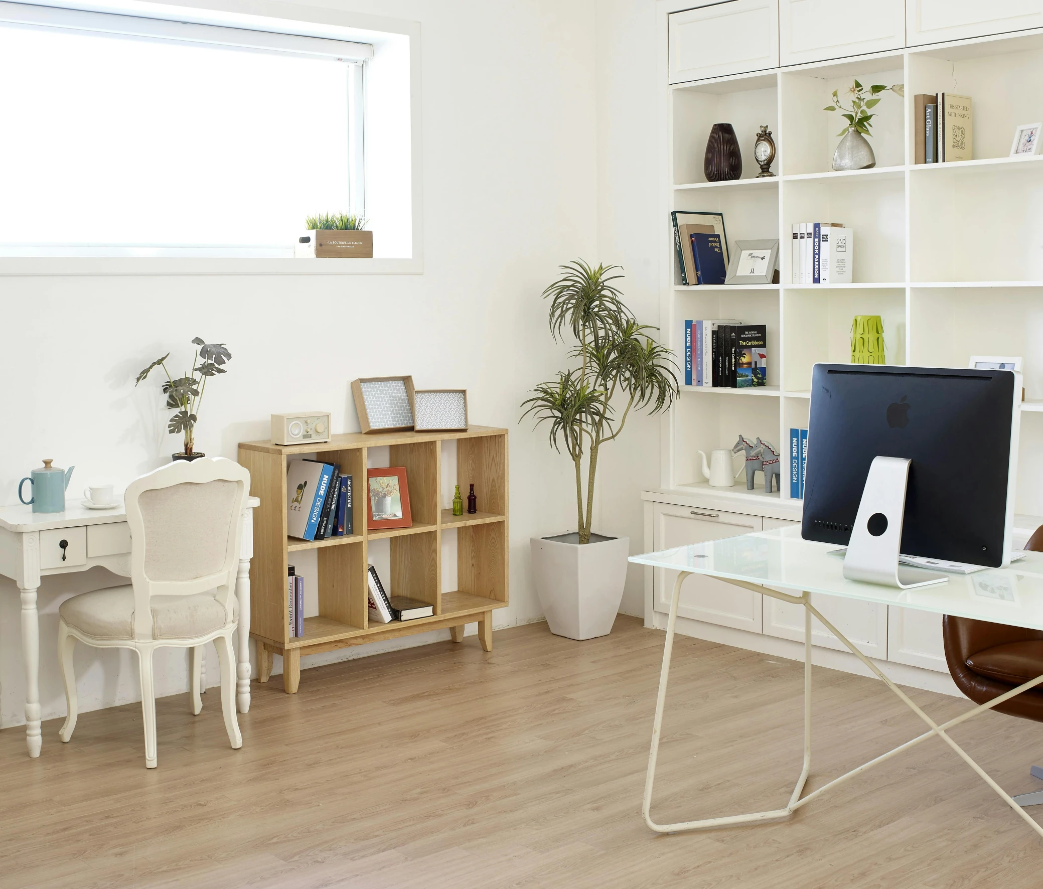 a computer sitting on top of a white desk, by Simon Gaon, pexels contest winner, light and space, bookshelf, cream - colored room, fresh modern style, doctors office