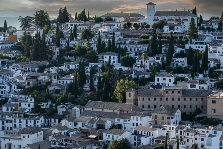 a view of a town from the top of a hill, by Alejandro Obregón, pexels contest winner, renaissance, white houses, moorish architecture, thumbnail, square