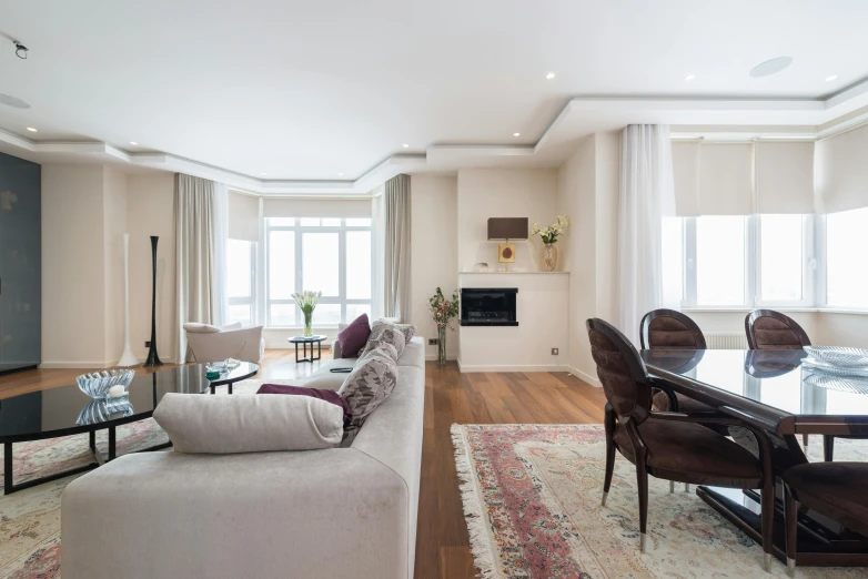 a living room filled with furniture and a fire place, a picture, unsplash, light and space, city apartment, arrendajo in avila pinewood, “diamonds, islamic interior design