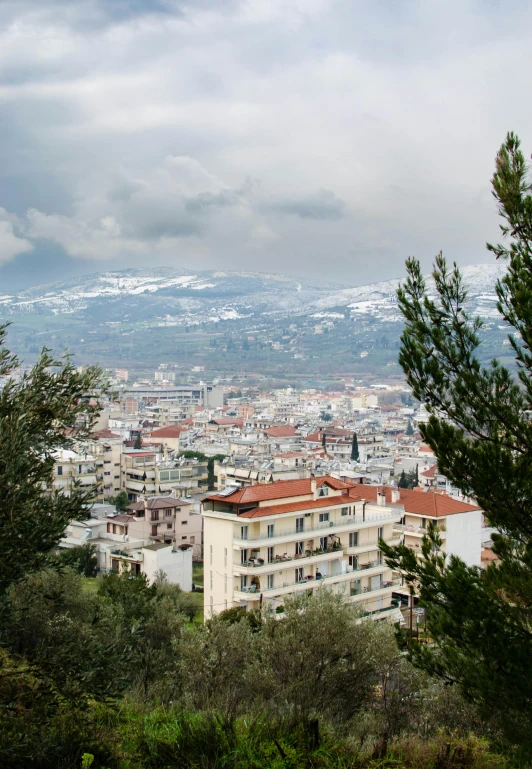 a view of a city from the top of a hill, by Niko Henrichon, greece, nice slight overcast weather, square, carson ellis