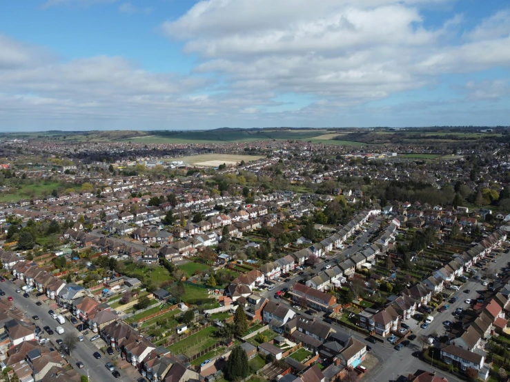 an aerial view of a residential area in england, happening, chesterfield, 4k photo gigapixel, carson ellis, high res 8k