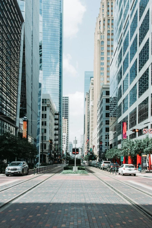 a city street filled with lots of tall buildings, pexels contest winner, tx, square, wide wide shot, high resolution photograph