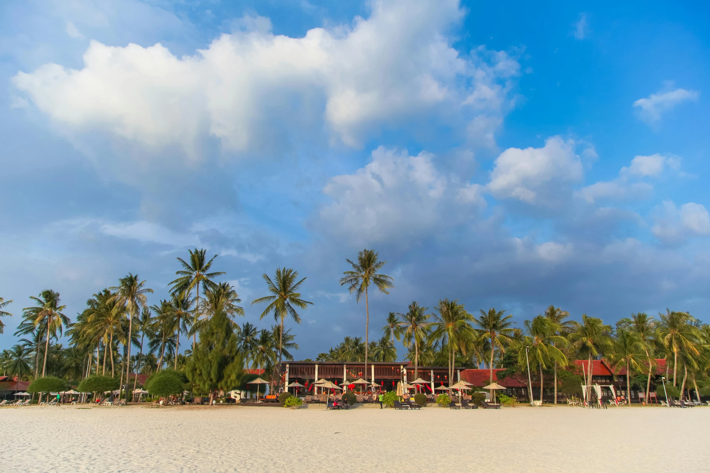 a beach filled with lots of white sand and palm trees, by Bernardino Mei, pexels contest winner, restaurant, square, maroon, big sky