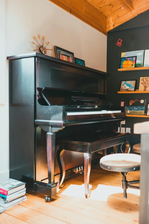 a living room filled with furniture and a piano, by Arabella Rankin, unsplash, modernism, multiple stories, studio photo, sideview, pick wu