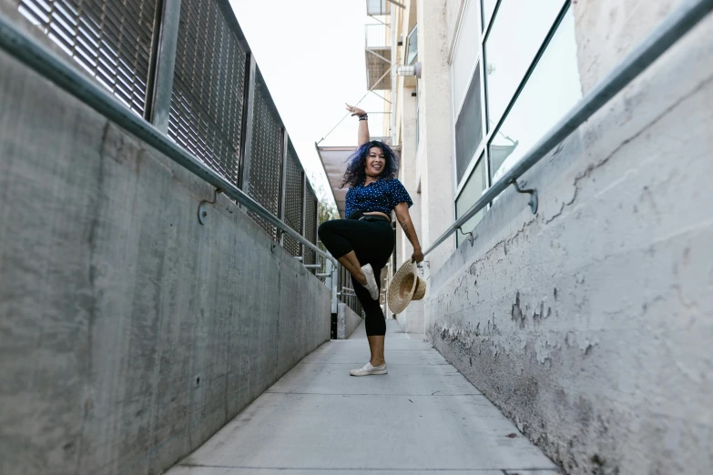 a woman flying through the air while riding a skateboard, by Meredith Dillman, unsplash, standing in an alleyway, avatar image, outfit photo