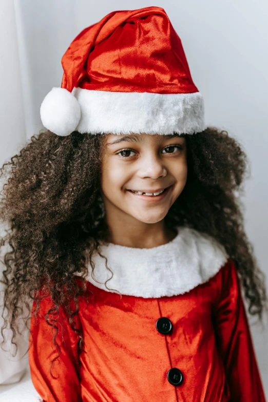 a little girl wearing a santa claus outfit, shutterstock contest winner, hurufiyya, a black man with long curly hair, portrait of a young teenage girl, uncropped, thumbnail