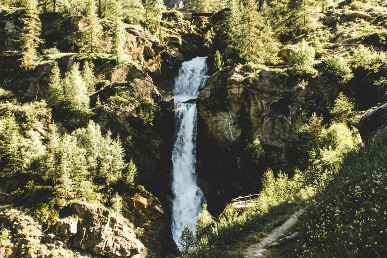 a waterfall in the middle of a forest, pexels contest winner, in the swiss alps, 2 5 6 x 2 5 6 pixels, whistler, thumbnail