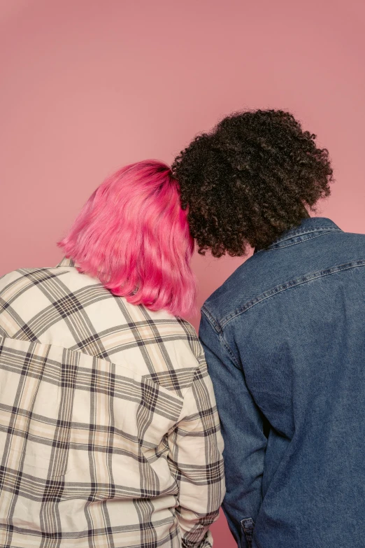 two people with pink hair standing next to each other, by Cosmo Alexander, trending on pexels, back of head, best friends, curls, lesbian embrace