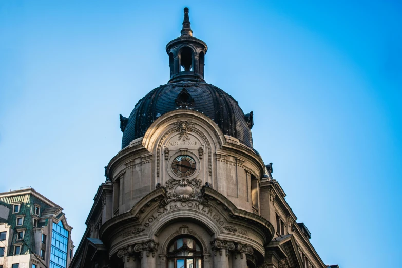 a tall building with a clock on top of it, pexels contest winner, art nouveau, rounded roof, romanian heritage, thumbnail, lit from bottom