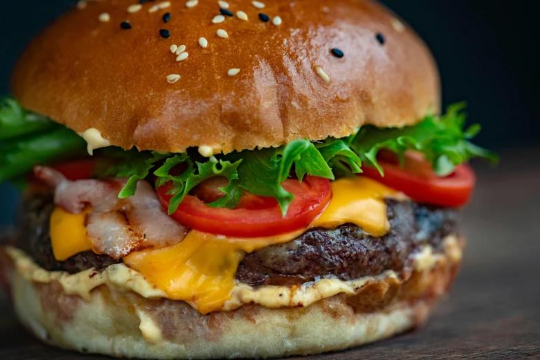 a hamburger sitting on top of a wooden table, profile image