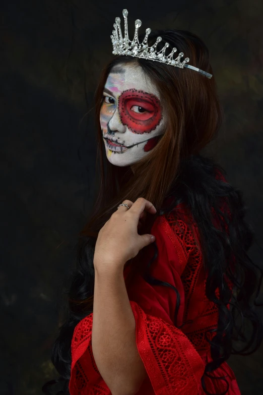 a woman in a red dress with a crown on her head, a portrait, by reyna rochin, pexels contest winner, skull face paint, half woman half skeleton, mexican, ((portrait))