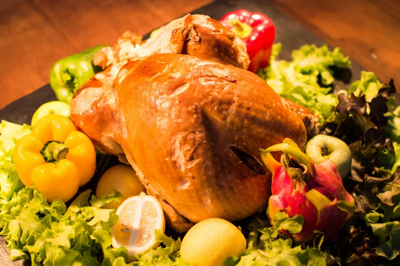 a close up of a plate of food on a table, by Julia Pishtar, the king of rooster, avatar image, foodphoto, holiday