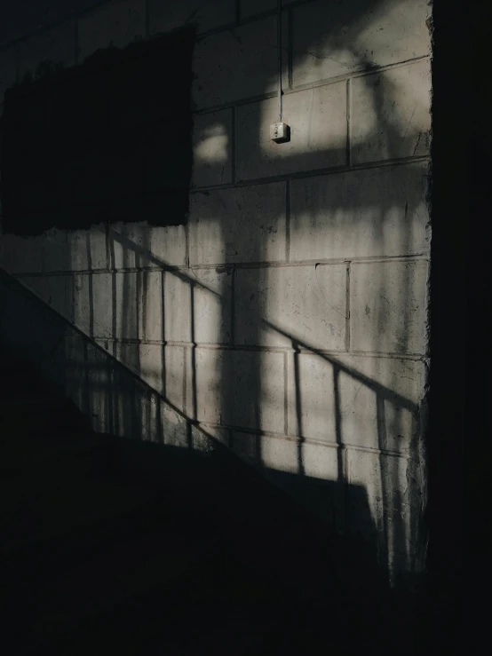 a man riding a skateboard up the side of a ramp, inspired by Elsa Bleda, unsplash contest winner, light and space, creepy shadows, location of a dark old house, instagram story, shattered wall