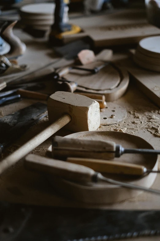 a bunch of tools sitting on top of a table, arts and crafts movement, thumbnail, carving, product shot, instrument