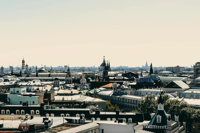a view of a city from the top of a building, pexels contest winner, berlin secession, black domes and spires, kremlin, bjarke ingels, plain background