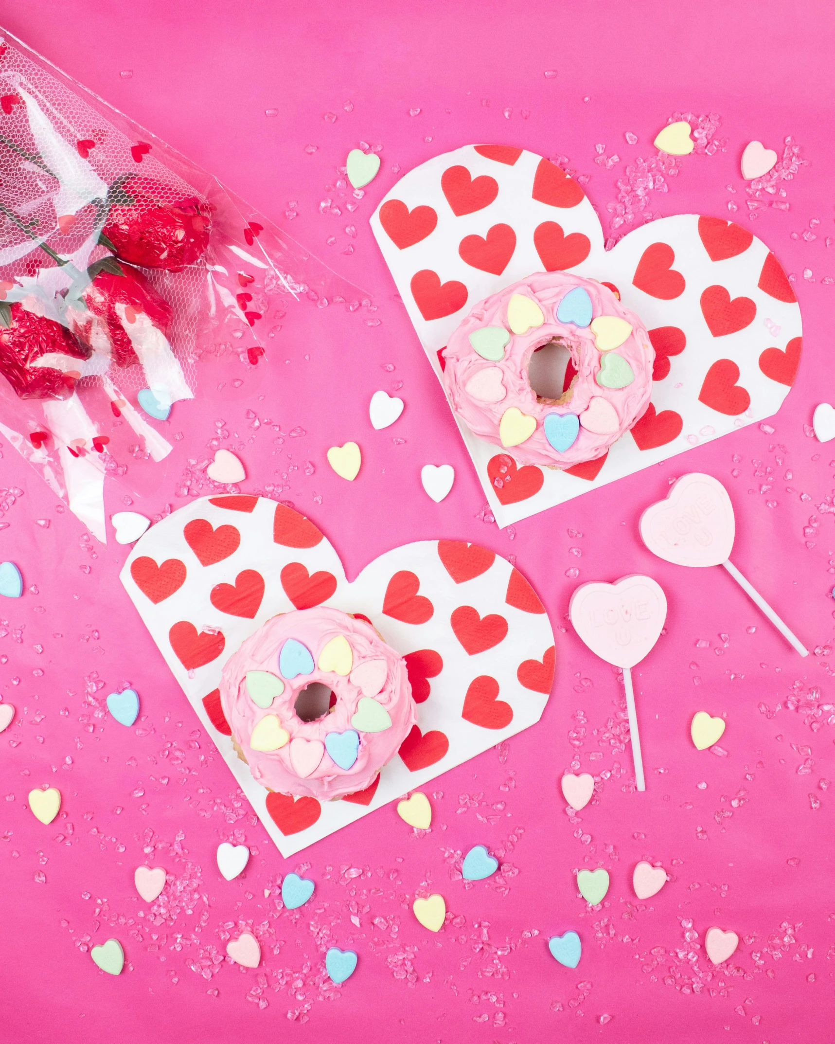 two heart shaped lollipop lollipop lollipop lollipop lollipop lollipop lollipop lollipop lo, by Julia Pishtar, emma bridgewater and paperchase, pink frosted donut, flat lay, red and white color scheme