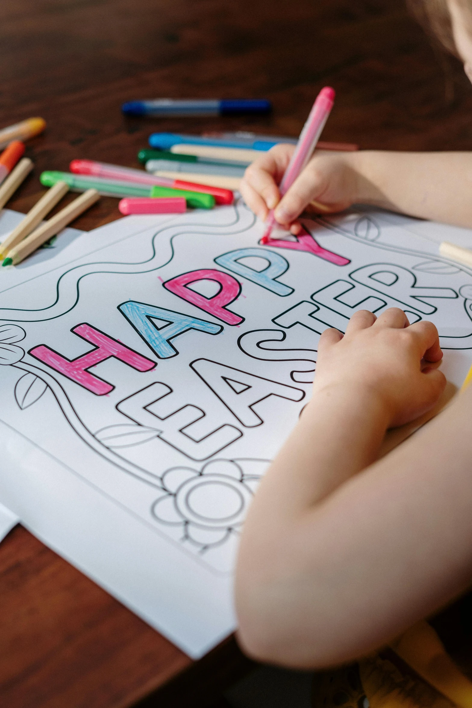 a little girl that is sitting at a table, pixabay, crayon art, easter, colouring - in sheet, square, happy