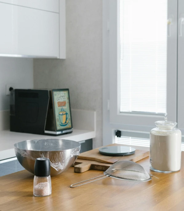 the kitchen counter is clean and ready to be used, unsplash, modernism, fan favorite, milk and mocha style, low quality photo, cupcake