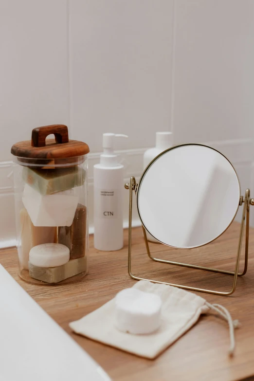 a mirror sitting on top of a wooden counter, unsplash, first aid kit, ilustration, focus on full - body, japanese collection product