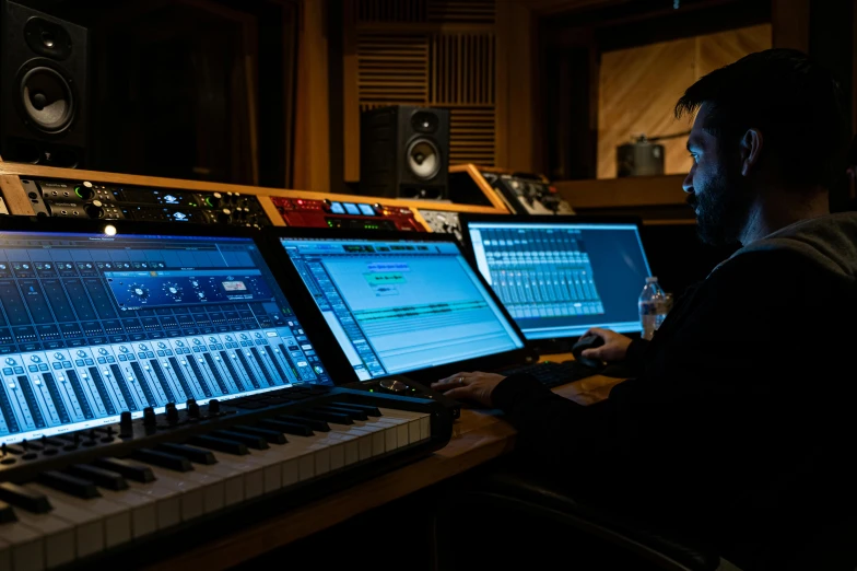 a man that is sitting in front of a keyboard, production ig studios, mix with rivendell architecture, audeze, thumbnail