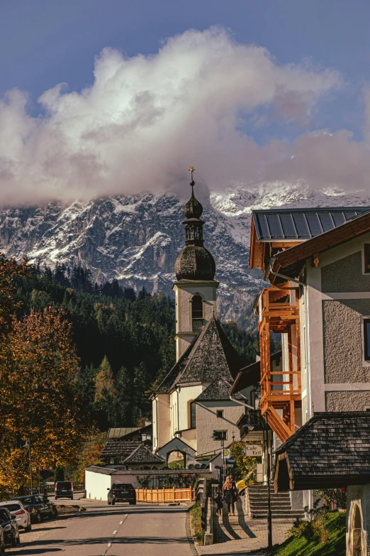 a small town with mountains in the background, a photo, inspired by Rudolf von Alt, pexels contest winner, renaissance, square, autumnal, alpine architecture, bernini