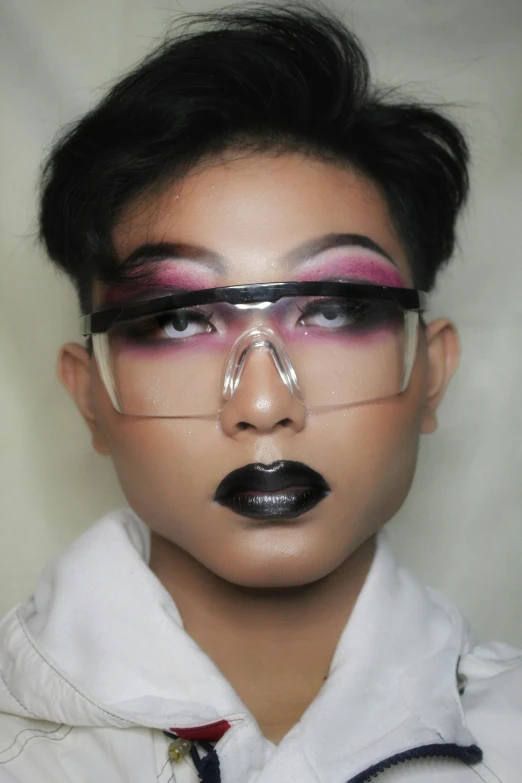 a close up of a person wearing glasses, inspired by Russell Dongjun Lu, tumblr, afrofuturism, with black glossy lips, malaysian, asian human, award winning makeup