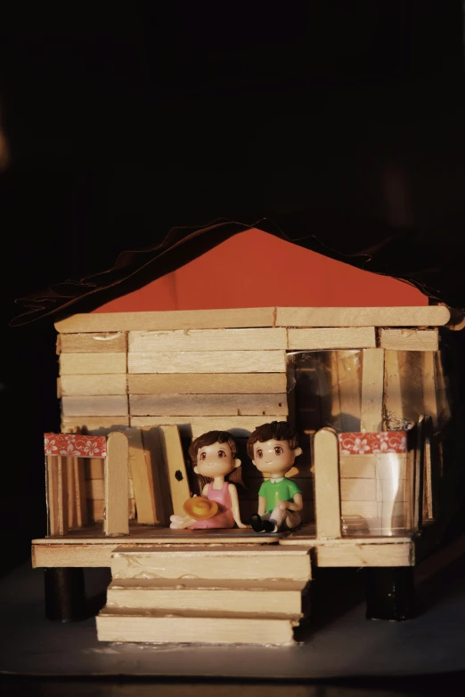 a doll house sitting on top of a table, a cartoon, unsplash, conceptual art, medium shot of two characters, summer night, made of cardboard, concert