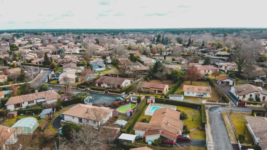 a bird's eye view of a residential neighborhood, pexels, les nabis, french village exterior, ultrawide angle cinematic view, 90s photo, drone photograpghy