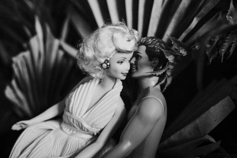 a couple of women sitting next to each other, an art deco sculpture, by Tina Blondell, tumblr, surrealism, barbie or ken doll, (tropicalism), marilyn monroe, kissing