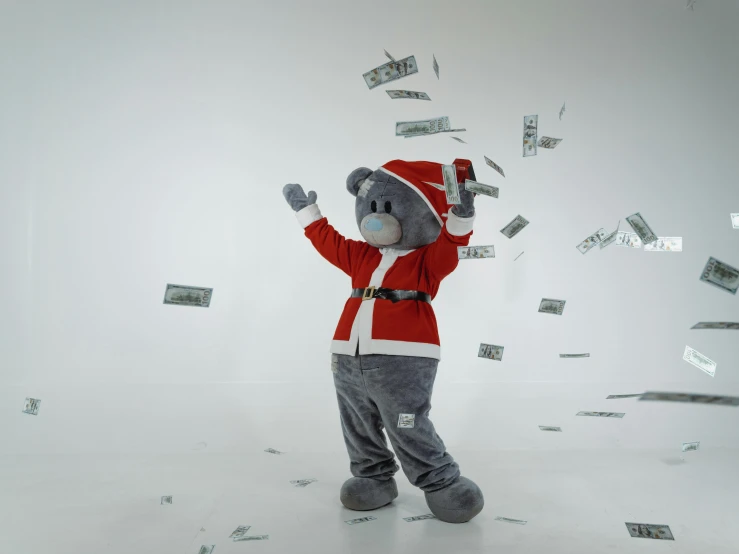 a person in a santa suit standing in front of a pile of money, pexels contest winner, dancing character, wearing a grey fur robe, teddy fresh, softplay