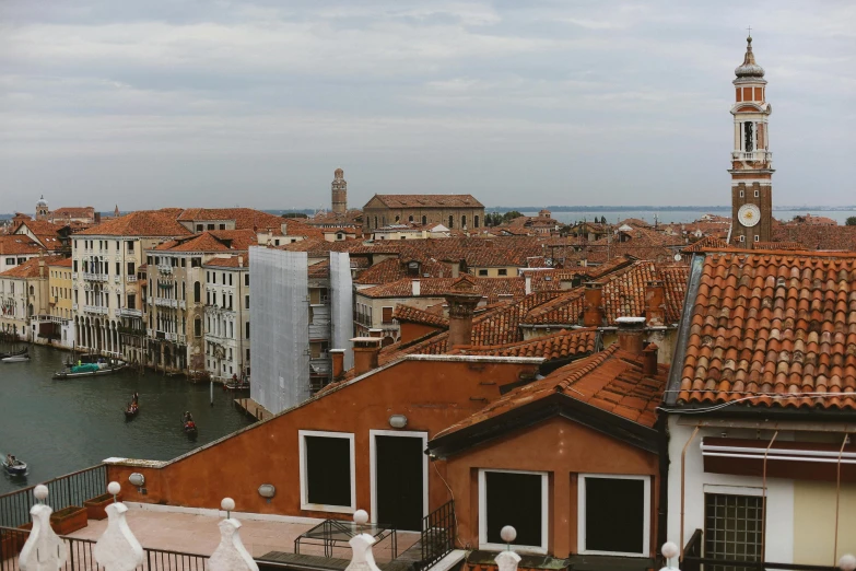 a view of a city from the top of a building, by Canaletto, pexels contest winner, visual art, venice biennale, slight overcast lighting, brown, 2022 photograph