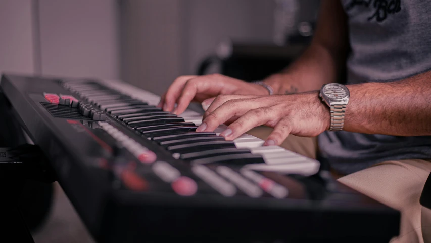 a close up of a person playing a keyboard, by Nick Fudge, unsplash, photorealism, ultra realistic photo, lachlan bailey, profile image, multiple stories