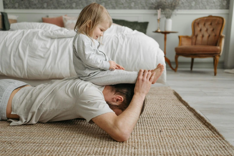 a man and a little girl laying on the floor, pexels contest winner, bedhead, an ahoge stands up on her head, 15081959 21121991 01012000 4k, thumbnail