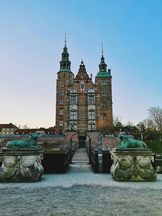 a large building with statues in front of it, by Jakob Emanuel Handmann, pexels contest winner, red castle in background, denmark, highly detailed in 4k”, square