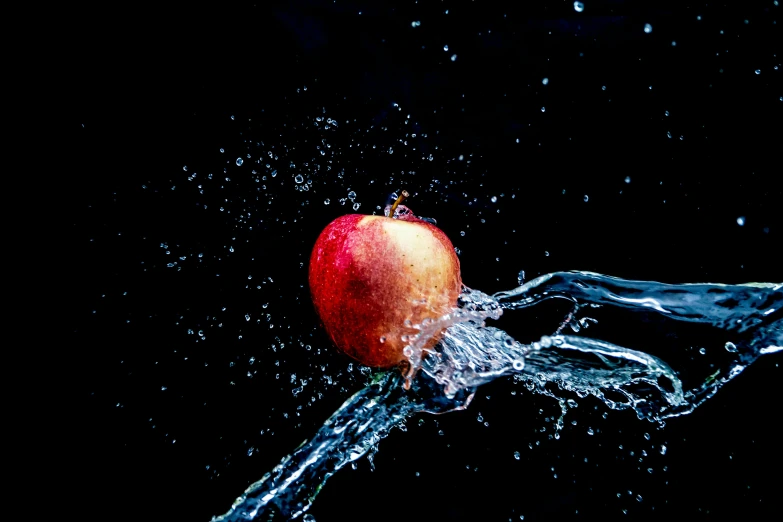 an apple being splashed with water on a black background, by Niko Henrichon, unsplash, 15081959 21121991 01012000 4k, thumbnail, swimming, 2 5 6 x 2 5 6 pixels